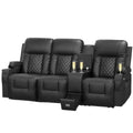 3 Seat Recliner Sofa with storage console, USB ports, and cup holders. Large reclining sofa in black leather with quilted accents, ideal for comfort and convenience.