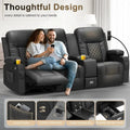 3 Seat Recliner Sofa with storage console, USB ports, and cup holders. Large reclining sofa in black leather with quilted accents, ideal for comfort and convenience.