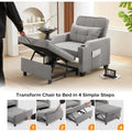 Convertible sleeper chair bed in gray fabric with adjustable recliner, USB ports, and cup holders. Easily transforms into a bed in four steps.