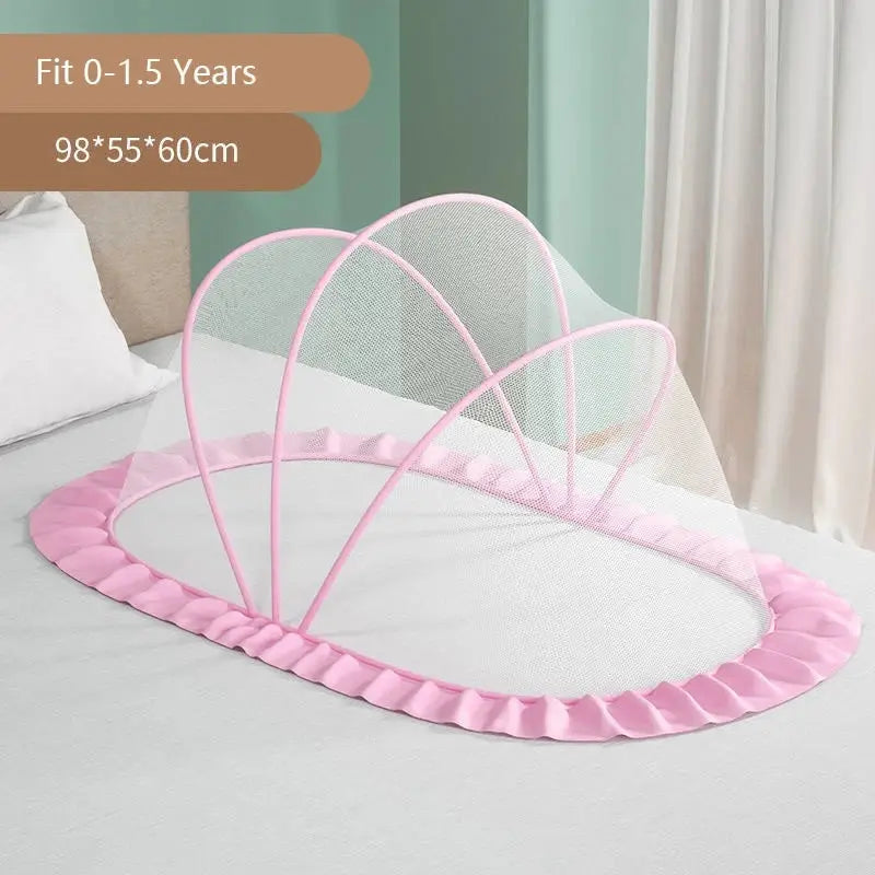 Foldable baby bed with mosquito net and cotton pillows, providing a safe and comfortable sleeping space for infants. Portable design for easy travel.