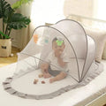 Foldable baby bed with mosquito net and cotton pillows, providing a safe and comfortable sleeping space for infants. Portable design for easy travel.
