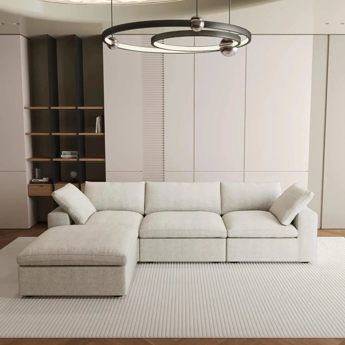 Cloud Modular Sectional Sofa in an L-shaped design with a wide, deep seat and down-filled cushions. A minimalist, khaki-colored couch for living room comfort.
