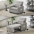 Convertible sleeper chair bed in gray fabric with adjustable recliner, USB ports, and cup holders. Easily transforms into a bed in four steps.
