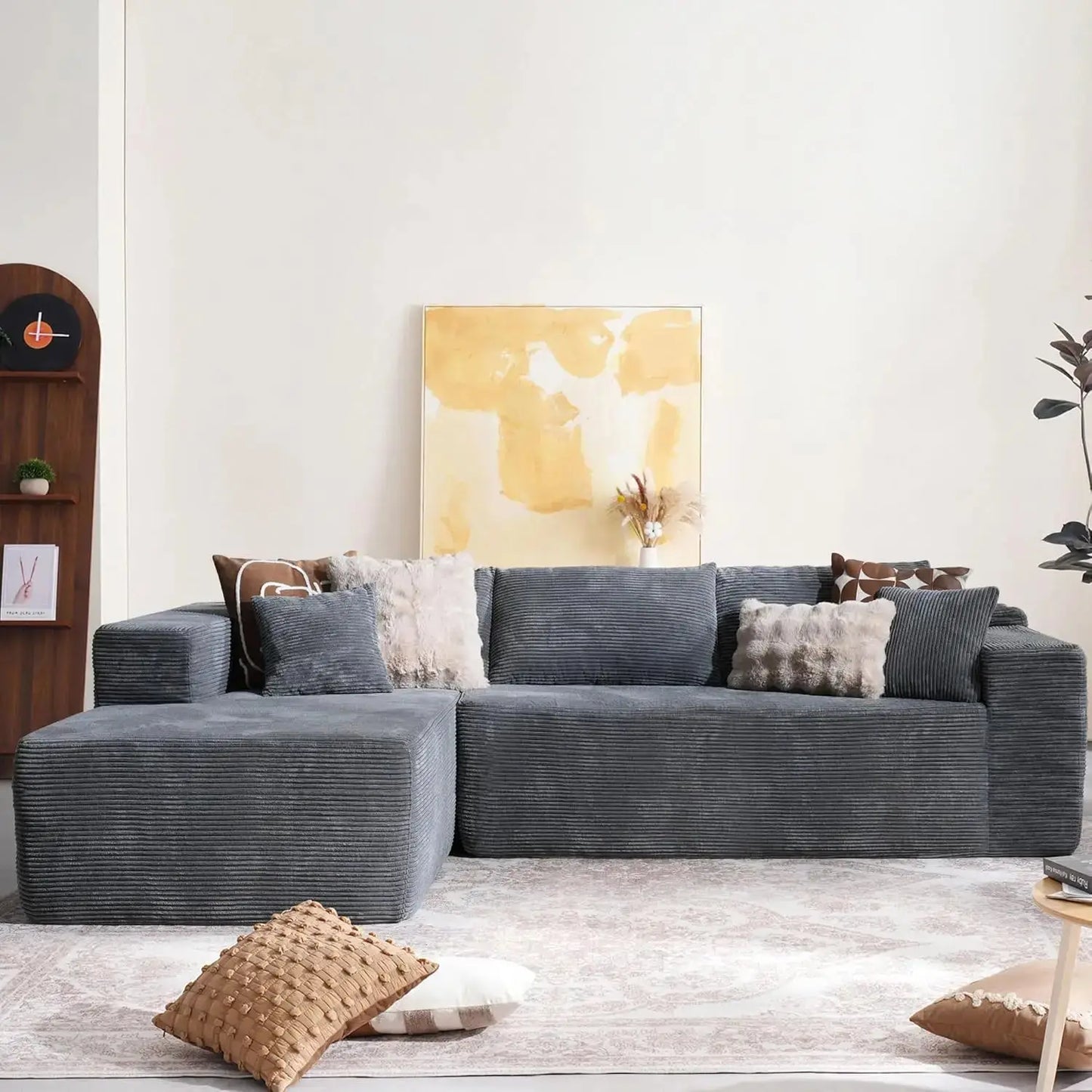 104-inch Cloud Sectional Couch with comfy chaise in a minimalist living room. Plush, boneless L-shape sofa with deep seating and modular design.