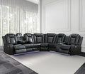 Leather reclining sectional sofa with power recliners, LED lighting, and built-in storage. Features wireless charging, reading lamps, and cup holders for ultimate comfort.