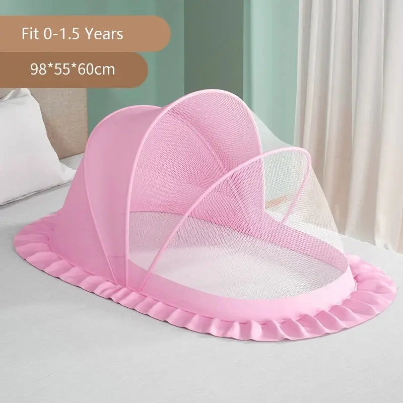 Foldable baby bed with mosquito net and cotton pillows, providing a safe and comfortable sleeping space for infants. Portable design for easy travel.