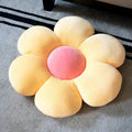 Six-Petal Flower Cushion Pillow in soft pastel colors, featuring a plush sunflower-inspired design. Perfect for adding warmth and charm to any space.