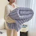Light luxury solid color multifunctional rabbit velvet blanket in thick, warm flannel. Ideal for bedroom and living room use during winter.