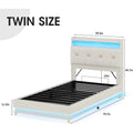 Twin size lift-up bed frame with storage headboard, charging station, and LED lights. Upholstered platform bed with under-bed storage, no box spring needed.