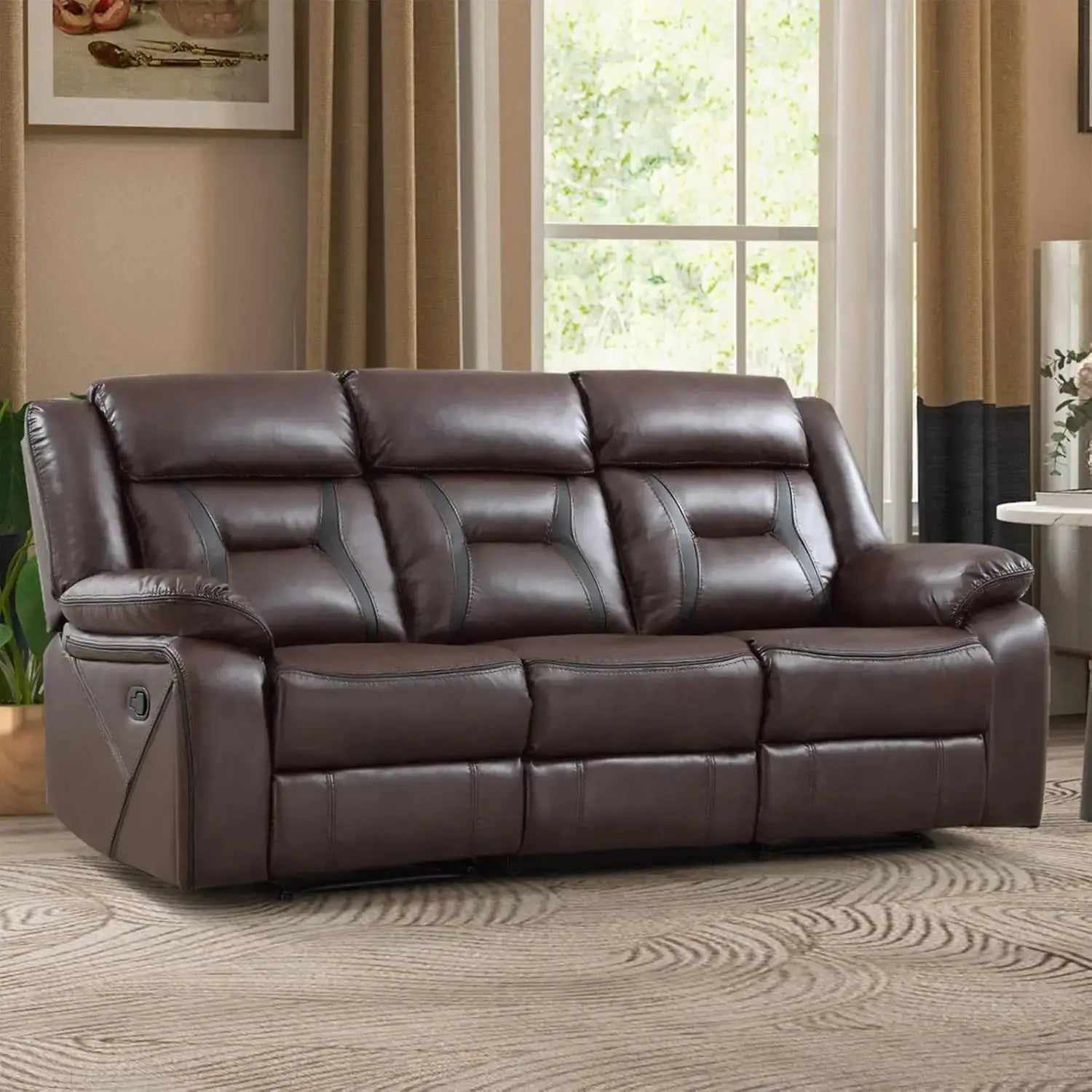 Brown faux leather reclining sofa with three seats, featuring manual recline function and plush cushioning. Stylish and durable furniture for living rooms.