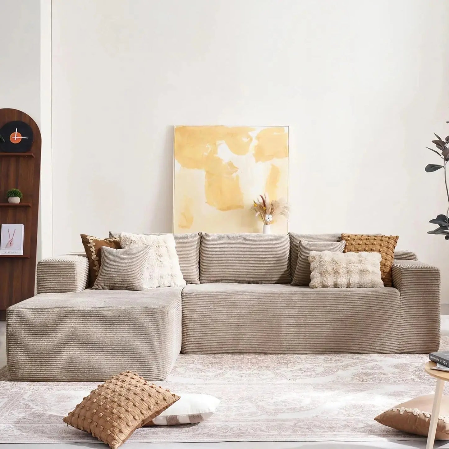 104-inch Cloud Sectional Couch with comfy chaise in a minimalist living room. Plush, boneless L-shape sofa with deep seating and modular design.