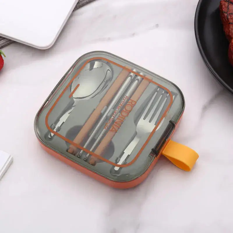 Stainless steel travel cutlery set in compact cases. Portable and reusable silverware with spoon, fork, and chopsticks, ideal for picnics or travel.