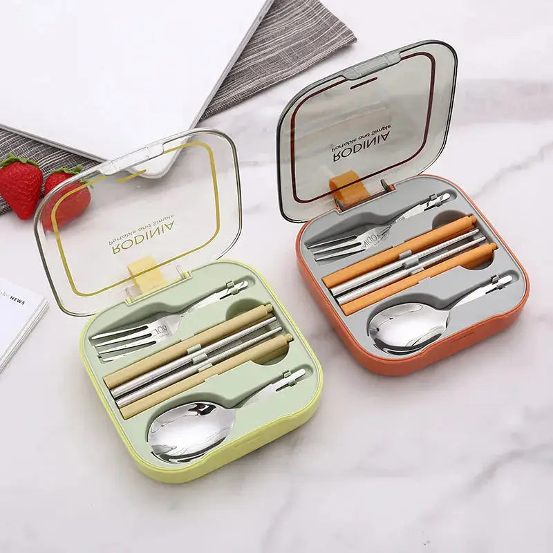 Stainless steel travel cutlery set in compact cases. Portable and reusable silverware with spoon, fork, and chopsticks, ideal for picnics or travel.