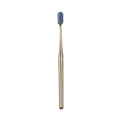 Single luxury gold toothbrush with blue bristles. Elegant electroplate gold handle for a premium brushing experience.