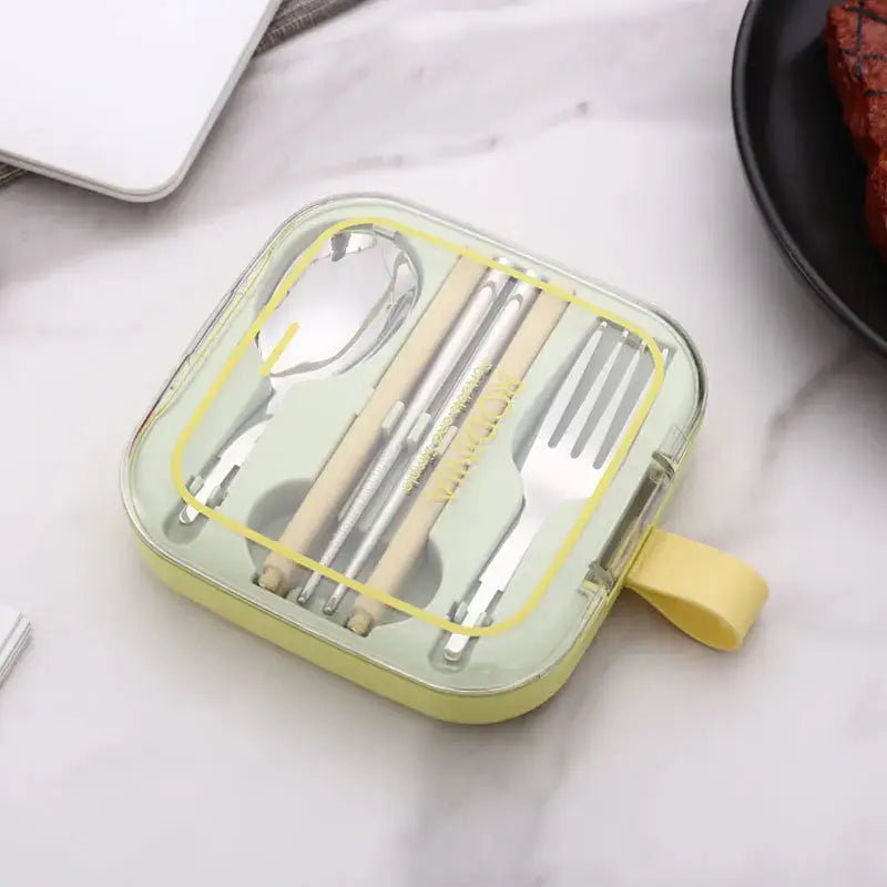 Stainless steel travel cutlery set in compact cases. Portable and reusable silverware with spoon, fork, and chopsticks, ideal for picnics or travel.